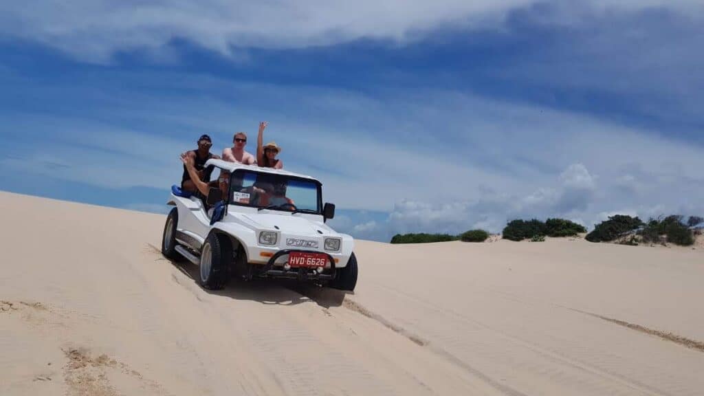 Jeep tour through the red sand dunes at Canoa Quebrada, Ceará