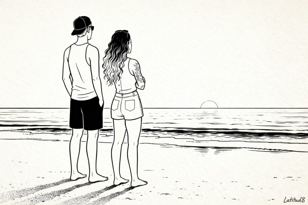 Keith and Steffany standing side by side on a Fortaleza beach in early morning light, both looking out to sea toward the horizon.